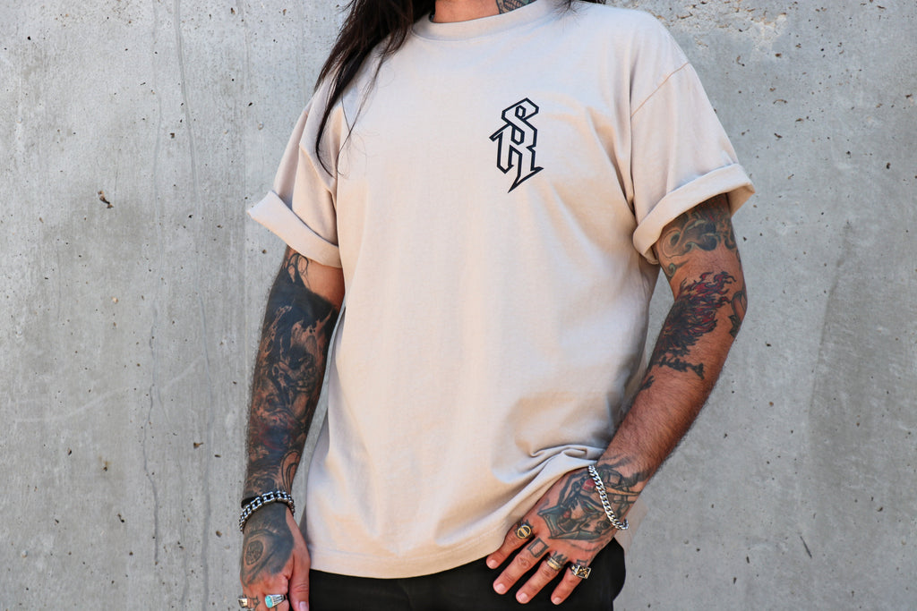Cornerstone Tee front – SR monogram chest logo on sand heavyweight oversized tee